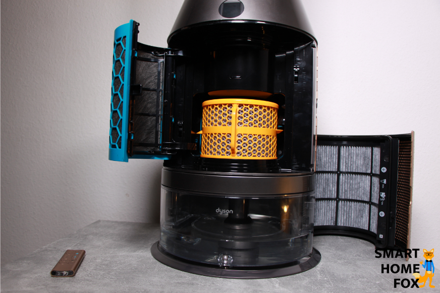 Оранжевый биостатический испаритель Dyson Purifier Humidify+Cool Formaldehyde PH04 вставлен в прибор.